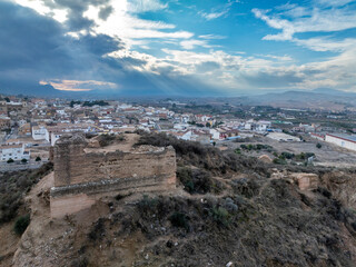 Canvas Print - Aerial view of medieval Pliego castle partially restored curtain walls, square tower on a hilltop in Southern Spain