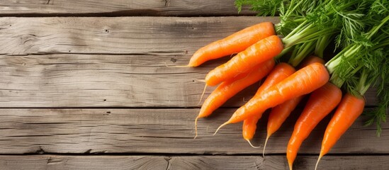 Wall Mural - Fresh organic carrots harvested from garden on rustic wooden table