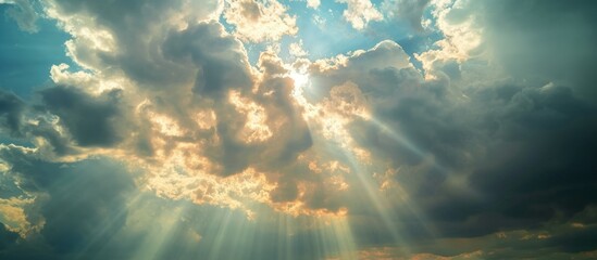 Wall Mural - majestic large white fluffy cloud floating in the vibrant blue sky on a sunny day