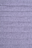 Fototapeta Tulipany - Gray knitted yarn background.