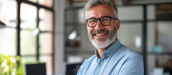 Poster - Portrait of a stylish man with glasses and a trendy beard smiling happily