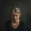 Middle-aged woman with a sad expression