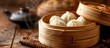 A bamboo steamer filled with dumplings sits on a wooden table, showcasing a traditional dish from various Asian cuisines like Khinkali, Momo, Buuz, and Xiaolongbao