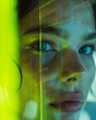 Woman with freckles and green and yellow light. A colorful portrait of a woman with freckles, accentuated by the vibrant green and yellow light, draws you in with its detailed closeup of her expressiv