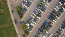 Crowded City Parking Drone View. Diverse Cars Riding At Asphalt Road To Carpark