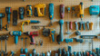 © Justlight - A collection of power tools from a cordless drill to a jigsaw to a circular saw hang neatly on a pegboard ready for use in any home renovation project.