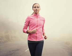 Canvas Print - Nature, fitness and portrait of woman running on mountain road for race, marathon or competition training. Sports, exercise and female athlete with cardio workout in misty outdoor woods or forest.