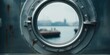 © Fotograf - Boat seen through metal porthole, suitable for nautical themes
