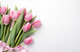 Fototapeta Tulipany - Pink and white tulips on a white background. Spring time concept.