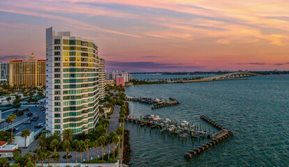 Canvas Print - a marina view, with sunset and clouds above, along a pier