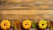A group of pumpkins with dried autumn leaves and twigs, on a chartreuse color wood boards