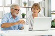 © Pormezz - Mature married couple plan money invest for retired