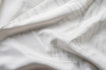 white silk background, satin texture, waving textile