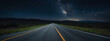 Secluded highway with a deserted asphalt road, embraced by the vast night sky.