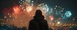 Group of people observing fireworks display during New Years Eve celebration. Concept New Years Eve, Fireworks Display, Celebration, Group of People, Observing,