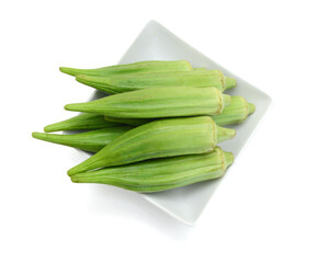 Wall Mural - Fresh raw okra isolated on white background, horizontal with copy space