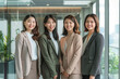 © Patcharaphon - Portrait of 4 happy beautiful Asian businesswoman in a creative office. Businessperson concept