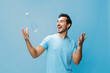 © SHOTPRIME STUDIO - Man drink healthy studio bottle attractive t-shirt lifestyle smile happy sport water