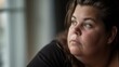 © Mechastock - Portrait of a plus-size obese woman with a serious somber expression