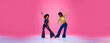 © Lustre Art Group  - Banner. Two people wearing in flamboyant disco outfit posing in striking dance pose looking to each other against gradient pink studio background. Concept of American culture, retro fashion. Ad