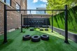 Outdoor Gym With Tires on Grass, Gymâ€™s outdoor area featuring artificial turf and tire flips, AI Generated