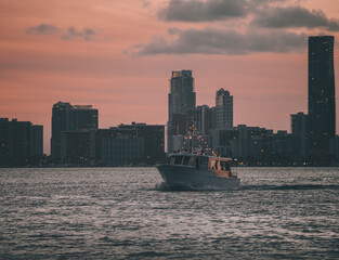 Wall Mural - city skyline at sunset boat travel miami Florida 