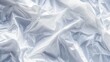 A close-up of a crinkled plastic bag against a stark white background, highlighting the play of light and shadow on the textured surface. 8k