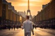Rear view of a man in a white suit holding a torch on the street in front of the Eiffel Tower in Paris, France.