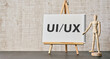 There is notebook with the word UIUX. It is as an eye-catching image.