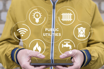 Man holding phone, using virtual interface sees text: PUBLIC UTILITIES. Smart public utilities concept. Water supply, electricity, gas, heating, sanitation, plumbing, household waste, internet access.