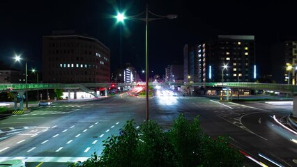 Wall Mural - A night timelapse of traffic jam at the large crossing in Kyoto wide shot zoom