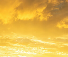 Wall Mural - yellow sky and clouds background