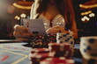 Playing poker in a casino, woman hand show playing cards