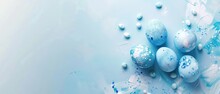 Blue Easter eggs scattered on a vibrant blue painted artistic background