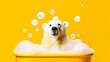 A polar bear enjoys a soothing bath in a tub, surrounded by frothy soap bubbles