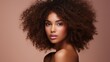© liliyabatyrova - Close-up Portrait of a beautiful sexy black woman with perfect fresh clean skin, curly hair on a beige background. Makeup, Natural Beauty,Cosmetics, Youth, Skin care, Spa concepts.
