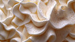 Macrophoto of Cream cheese is a soft, usually mild-tasting fresh cheese made from milk and cream
