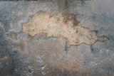 Fototapeta Sport - The dirty water on the cement floor is drying up.