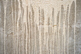 Fototapeta Sport - Close up of cement water stains from construction on the cement wall