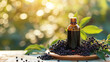 © Артур Комис - jar with essential oil extract of elderberry oil on a wooden background