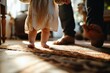 A baby's tiny bare feet take careful steps on a patterned rug, guided by an adult's hands, in a warm, sunlit room, Generative AI