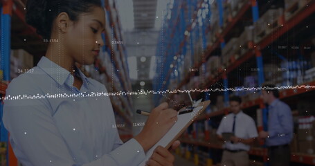 Canvas Print - Image of financial data processing over diverse business people in warehouse