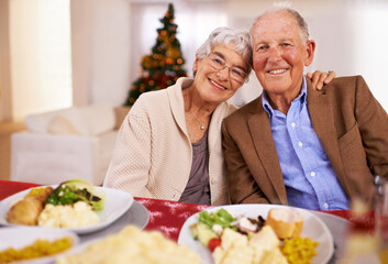 Poster - Christmas, smile and portrait of senior couple in home for dinner, bonding and happy together at party. Xmas, face and elderly man with woman at table, food and love of people on festive holiday