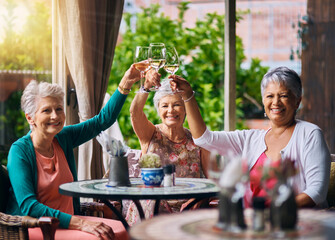 Poster - Cheers, wine and portrait with old women in restaurant for bonding, lunch and relax. Retirement, hospitality and happiness with senior friends with drink for social celebration, memory and support