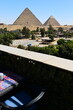 GIZA,EGYPT - JUNE 12 2023: Giza pyramid complex includes three pyramid complexes known as Pyramid of Khufu,Karfe and Menkaura and Egyptologists believe that they were built around 2560