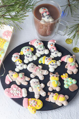 Wall Mural - Christmas marshmallows. Winter candy. Sweet food in december. Snowman and Santa Claus