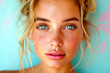 © ADDICTIVE STOCK - Generative AI illustration of close-up of a young woman with freckles, tousled hair, and blue eyes against a pastel background