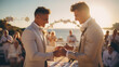 gay couple exchange rings and doing the wedding ceremony at a beach