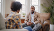 Handsome young african american psychologist man in comfortable armchair during psychological mental supporting patient session. Mental health, psychiatrist professional help and support concept image