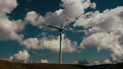 Wall Mural - Wind farm or wind park, is a group of wind turbines used to produce electricity. This particular wind farm is located on the mountains of Italy and it allows to realize clean energy enviromental